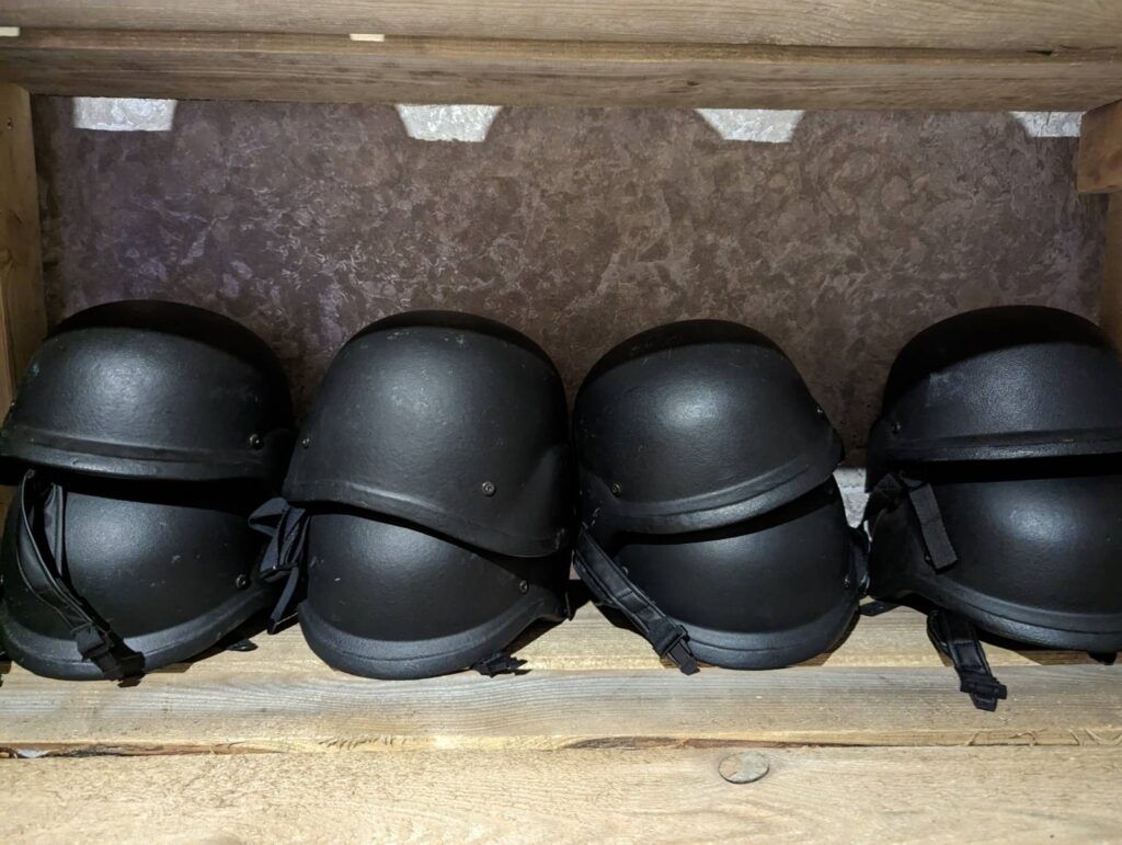 Neatly sorted helmets in the Base UA mission room